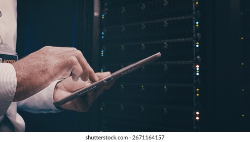 Engineer, hands or man with tablet in server room for security audit, system backup and update. Data center, technician and digital tech for cloud computing, hardware installation and problem solving