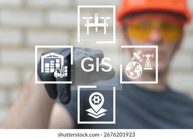 Engineer in hard hat using virtual touch screen presses the abbreviation GIS. GIS Geographic Information System Modern Industry 4.0 Software Database Transportation Tracking Concept.
