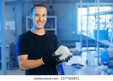 Engineer hold concrete cube in industry lab for testing building materials. Controls size and quality of cement mortar. - Powered by Shutterstock