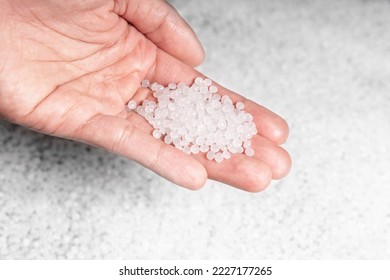 engineer hold white plastic on hand polymer petrochemical product as polymer raw material for plastic in polymer chemical industry design and test in polymer science laboratory - Shutterstock ID 2227177265