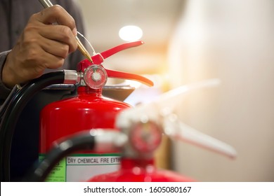 Engineer Are Inspection Fire Extinguisher In Fire Control Room For Emergency, Rescue And Safety Concept.