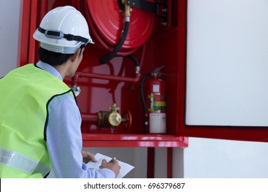 Engineer Inspection Fire Extinguisher And Fire Hose.