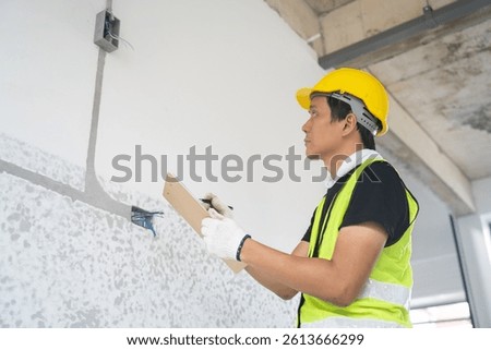 Engineer inspector or auditor work in construction site to check audit and inspect residential house building quality property development thumb up as good and pass audit with checklist as contractor