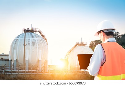 Engineer Inspects The Natural Gas Storage Tank