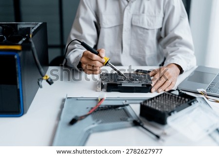 IT Engineer installing Hardware Equipment Development Facility Engineer  Maintenance computer Motherboard Electronic repair shop technology business.