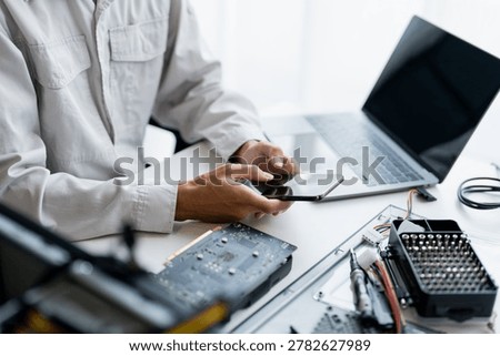 IT Engineer installing Hardware Equipment Development Facility Engineer  Maintenance computer Motherboard Electronic repair shop technology business.
