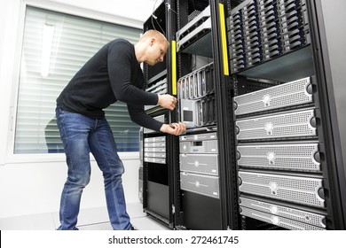 IT Engineer Installs Blade Server In Datacenter