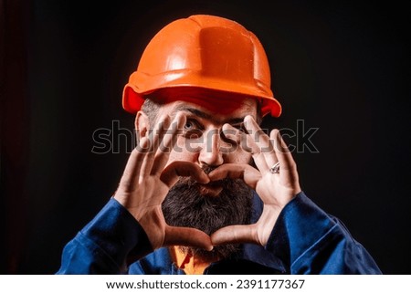 Engineer man, builder with building equipment. Safety helmet. Renovation. Man in hardhat. Heavy work. Labor day. Builder working. Hard job. Construction man, worker contractor foreman workman.