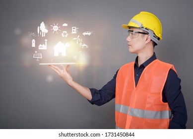 Engineer man is holding digital engineering plan with ecological data, modern city technology concept - Powered by Shutterstock - Get 15% off with code: PIKWIZARD15