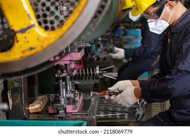 Engineer Man Wearing Safety Glass And Hygiene Mask Working In The CNC Metal Factory. Selective Focus On Hand. New Normal Working At The Plant. Come Back To Work After COVID 19