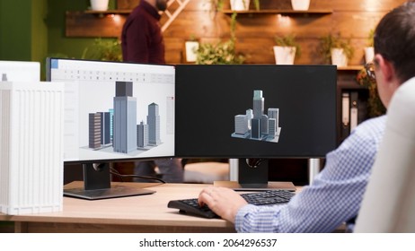 Engineer Man Working At Architectural Building Prototype On Computer Using Digital Company Software. Workaholic Architect Developing Industrial Construction Structure For Creativity Project