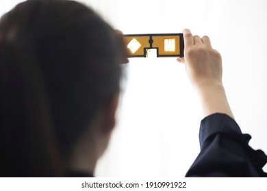 Engineer measuring with horizontal instrument

