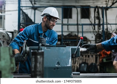 Engineer Men Wearing Uniform Safety Maintenance In Factory Working Machine Lathe Metal, Professional Worker Man.