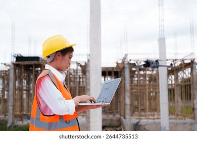 Engineer operating drone at construction site for industrial inspection and surveillance, ensuring safety, power infrastructure development, and environmental monitoring with advanced remote control t - Powered by Shutterstock - Get 15% off with code: PIKWIZARD15