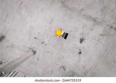 Engineer operating drone at construction site for industrial inspection and surveillance, ensuring safety, power infrastructure development, and environmental monitoring with advanced remote control t