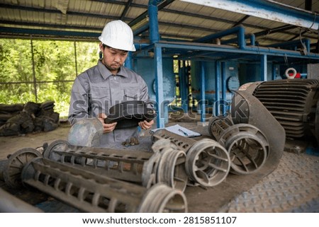 Engineer Performing Preventive Maintenance on Industrial Pump System in Water Treatment Plant