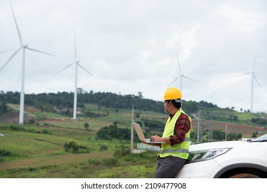 Engineer Planning Wind Turbine Maintenance Renewable Energy And Wind Generators Work With The Concept Of Renewable Energy, Wind Farm Power Generation.