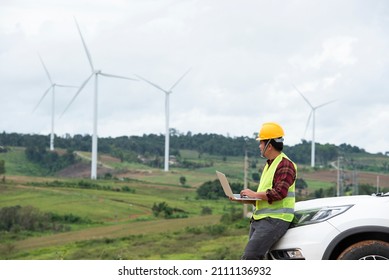 Engineer Planning Wind Turbine Maintenance Renewable Energy And Wind Generators Work With The Concept Of Renewable Energy, Wind Farm Power Generation.