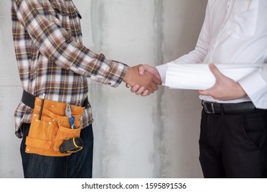 Engineer project manager and foreman site shake hand for success in project construction site