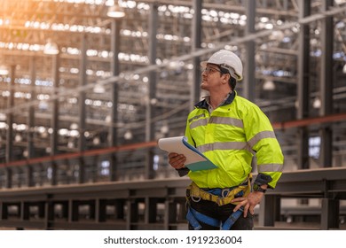 Engineer railway under inspection and checking construction process railway and checking work on railroad station .Engineer wearing safety uniform and safety helmet in work. - Powered by Shutterstock