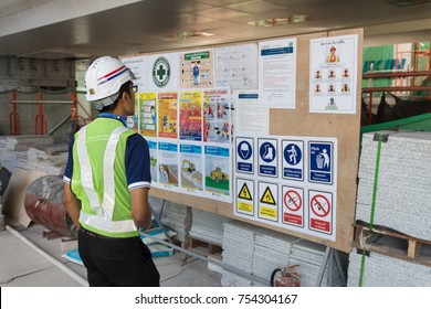 The Engineer Reading Notice Board Of Safety Policy Before Working In Construction Site In Bangkok Thailand On 31 Oct 2017. Selective Focus