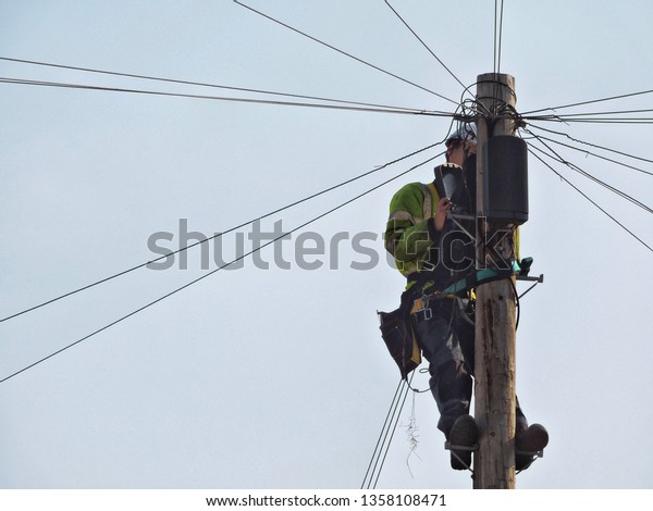 Engineer Repairing Cables On Telegraphic Pole Stock Photo (Edit Now ...