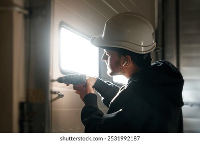 Engineer repairing an unloading gate