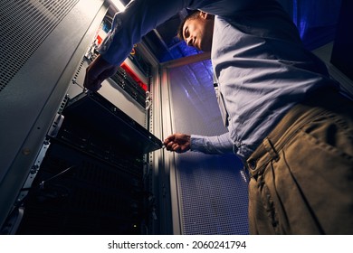 IT Engineer Replacing Old Equipment In Data Center