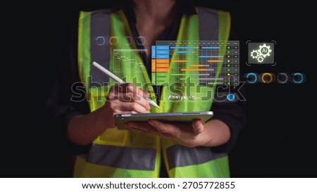 Engineer in safety vest using tablet with AI and data analytics interface overlay. Represents smart technology, industrial automation, project planning, and AI-powered analysis in the modern workplace