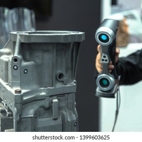 Engineer scans the part with 3D scanner. Technology scanning