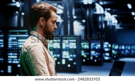 Engineer servicing server clusters with high computing power enabling hyperscale data center to support demanding applications, including artificial intelligence and machine learning workloads