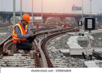 engineer Sitting on railway inspection. construction worker on railways. Engineer work on railway. rail, engineer, Infrastructure