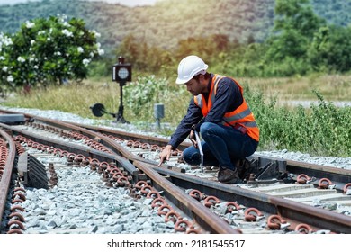 engineer Sitting on railway inspection. construction worker on railways. Engineer work on railway.rail,engineer,Infrastructure