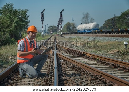 Engineer sitting on railway inspection. construction worker on railways. Engineer work on Railway. Rail, engineer, Infrastructure