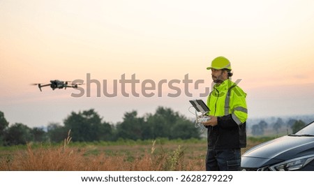 Engineer Specialists Pilot Drone on Construction Site. Architectural Engineer and Safety Engineering Inspector Fly Drone at industrial plant.