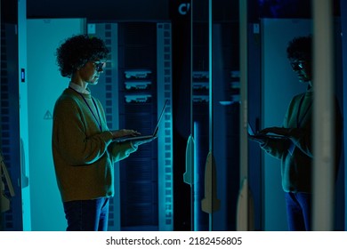 Engineer standing in data center