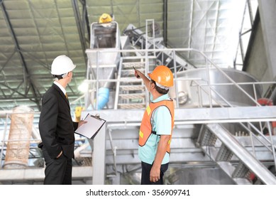 Engineer And Supervisors Are Checking Manufacturing.