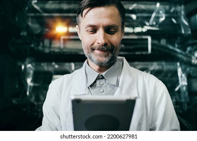 Engineer With Tablet Working At Polymer Factory