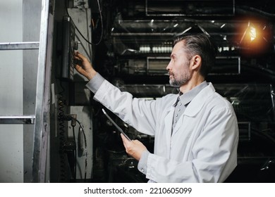 Engineer With Tablet Working At Polymer Factory