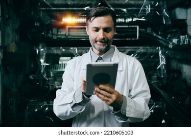 Engineer With Tablet Working At Polymer Factory