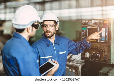 Engineer team talking together to discussion teach and learn give education technical about using machine in factory workplace. - Shutterstock ID 1662062767