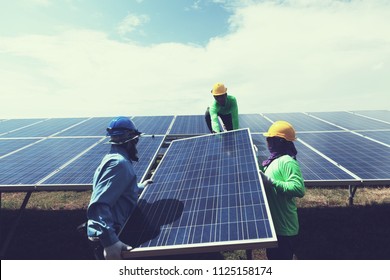 Engineer Team Working On Replacement Solar Panel In Solar Power Plant;engineer And Electrician Team Swapping And Install Solar Panel After Solar Panel Voltage Drop
