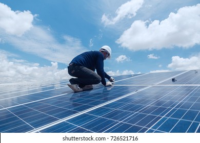 Engineer Team Working On Replacement Solar Panel In Solar Power Plant;engineer And Electrician Team Swapping And Install Solar Panel ; Electrician Team Checking Hot Spot On Break Panel
