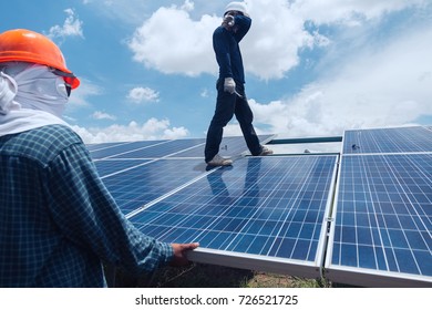 engineer team working on replacement solar panel in solar power plant;engineer and electrician team swapping and install solar panel ; electrician team checking hot spot on break panel
 - Shutterstock ID 726521725