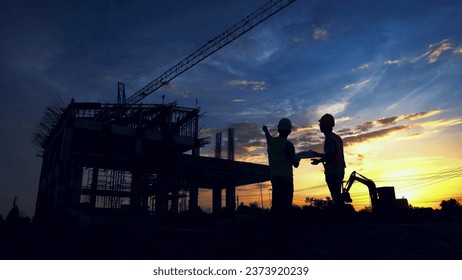 Engineer Teamwork Concept,Worker team join hands together in construction site.	
