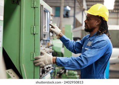 engineer or technician checking and control lathe machine in the factory
