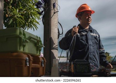 Engineer or technician are checking of fiber optic cable lines for maintenance. - Powered by Shutterstock