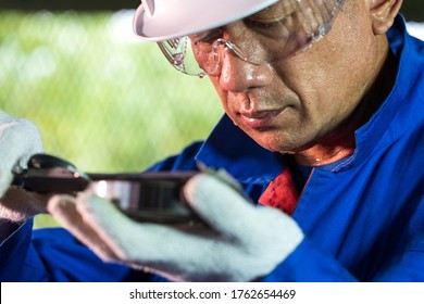 Engineer or Technician man maturing the ball bearing by vernier caliper tools in the industrial factory, Industrial Concept