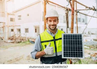 Engineer thumbs up happy with Solar panel for saving energy recommend for modern home construction