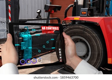 Engineer use augmented reality software in smart factory production line with automated application . Futuristic machinery in working in concept of Industry 4.0 or 4th industrial revolution.